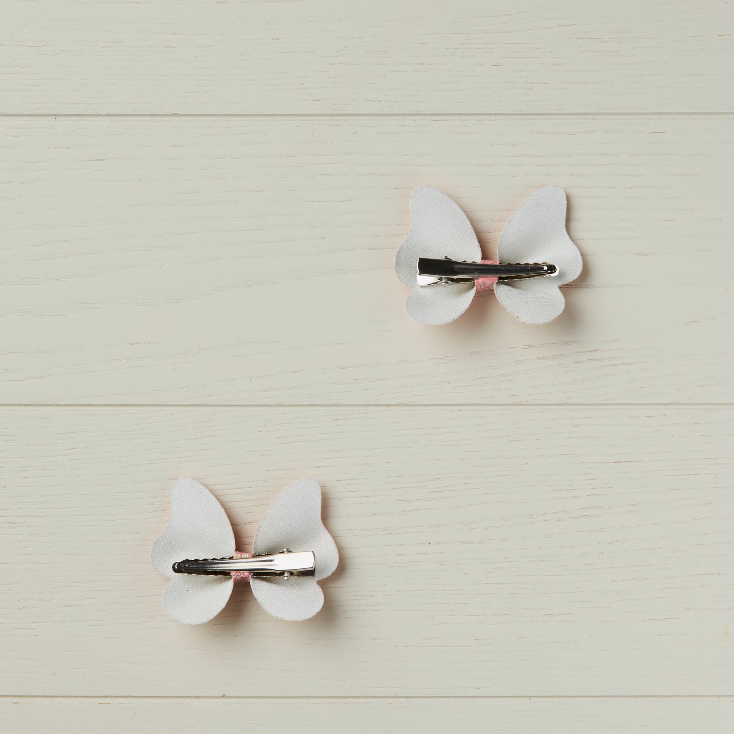 2 Pastel Pink Glitter Butterfly Clips
