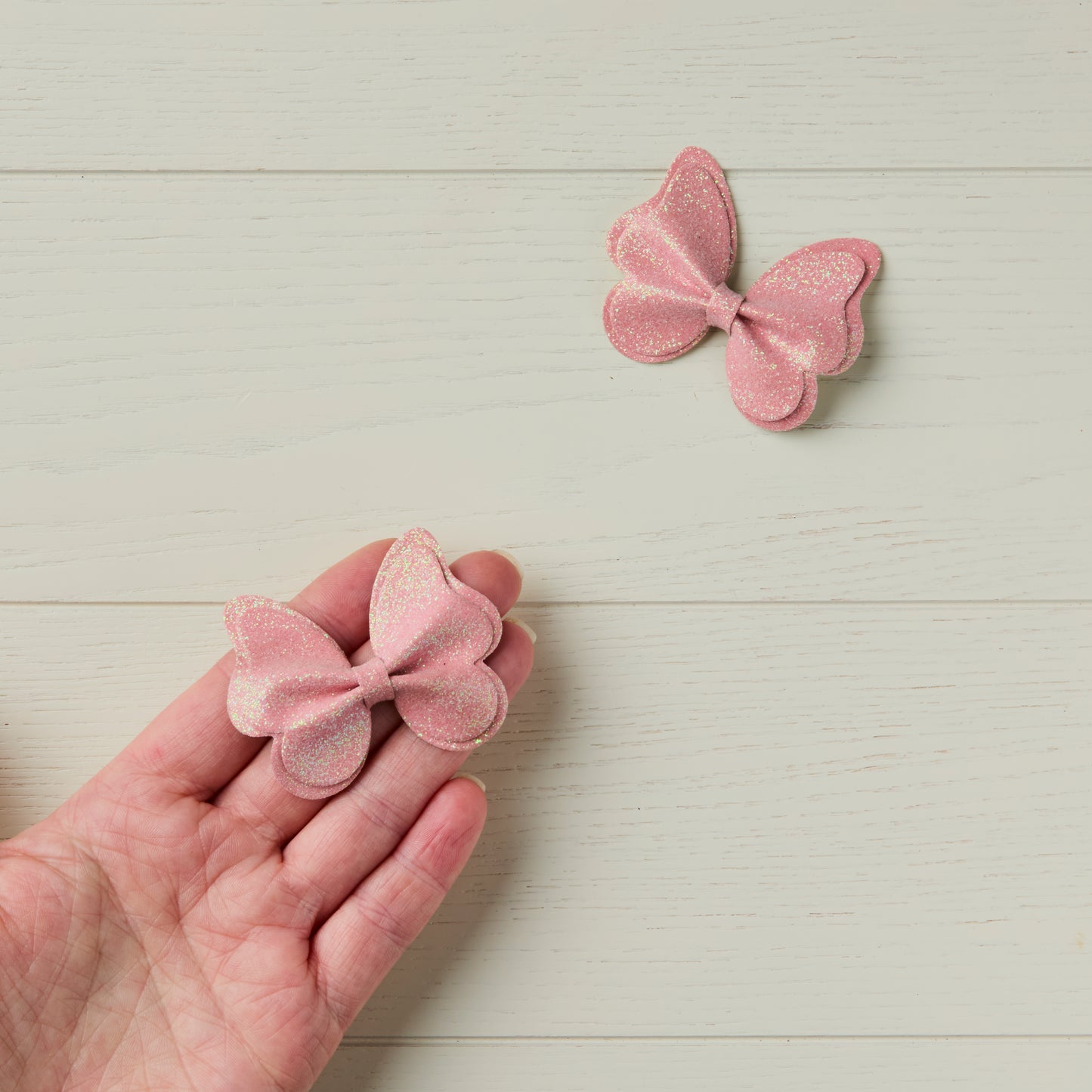 2 Pastel Pink Glitter Butterfly Clips