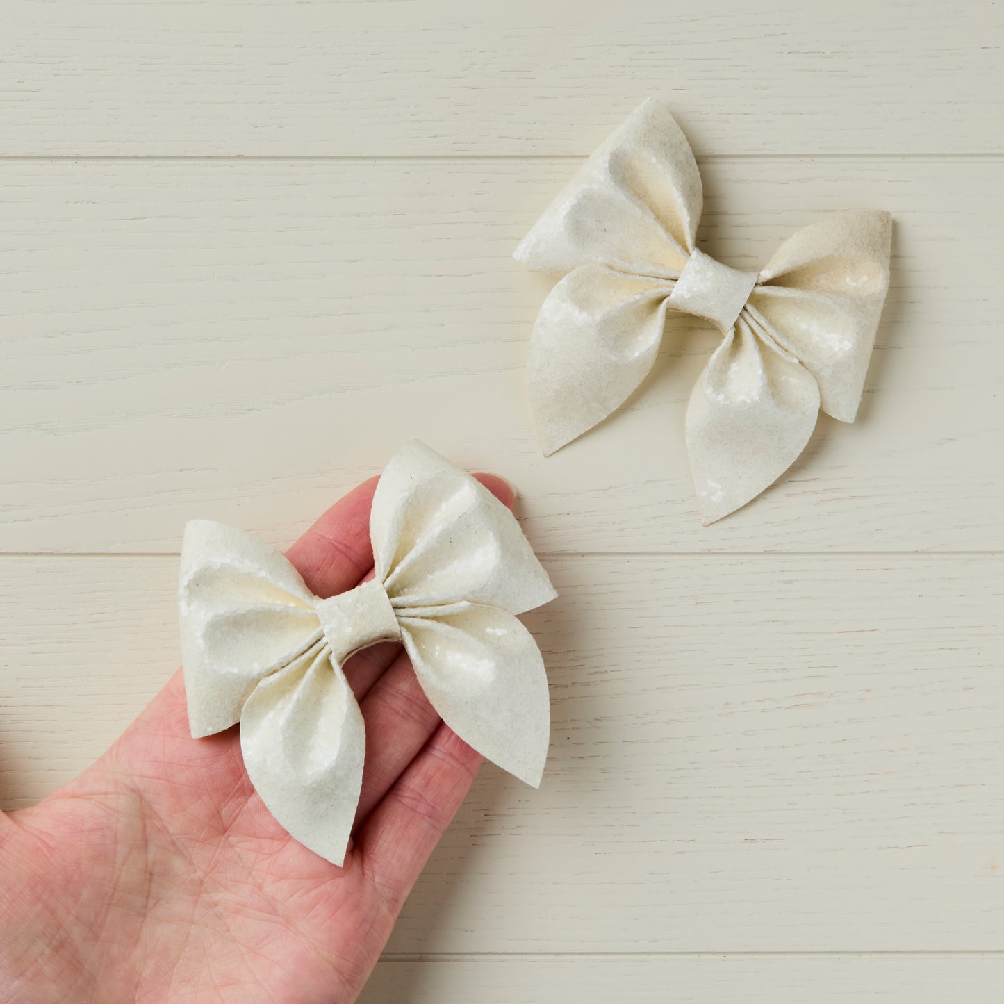 2 Off White Chunky Glitter Hair Bows