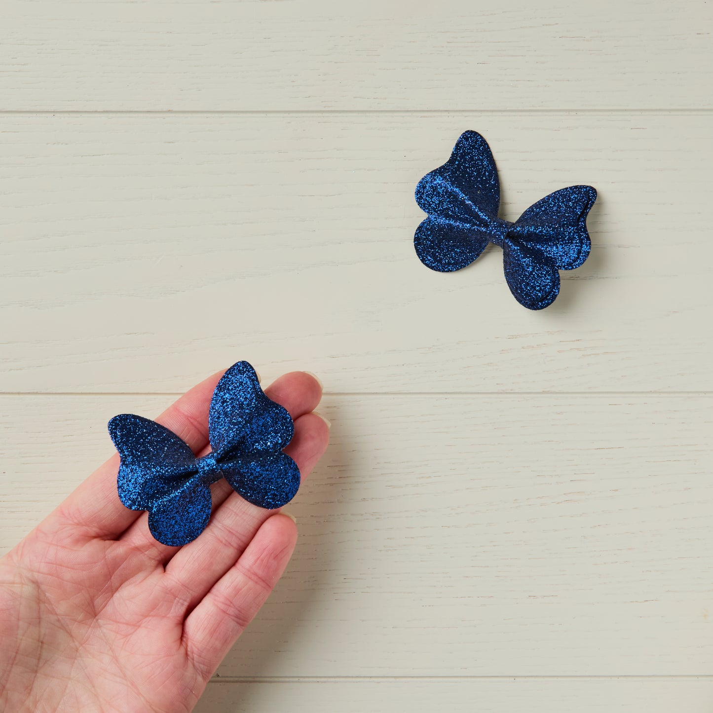 2 Navy Blue Glitter Butterfly Clips