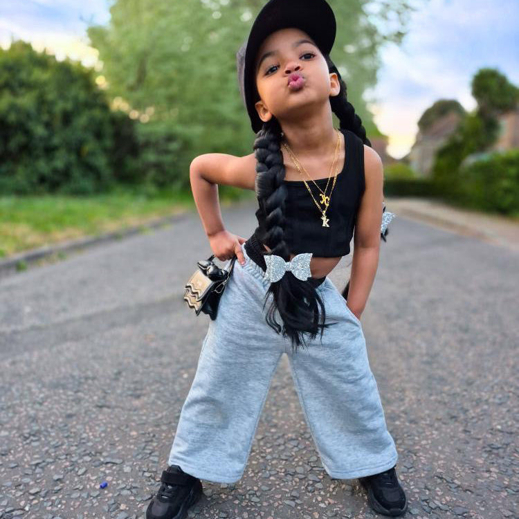 photo of a girl modelling silver glitter hair bows
