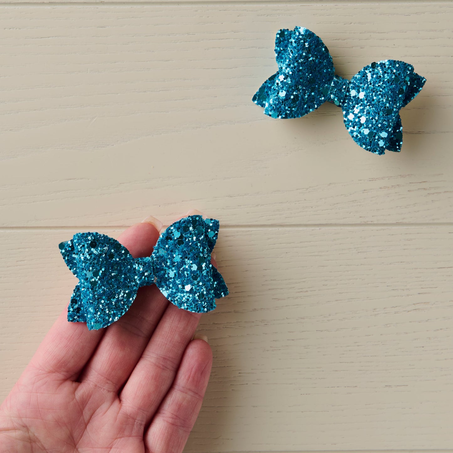 2 Sky Blue Glitter Mini Hair Bows