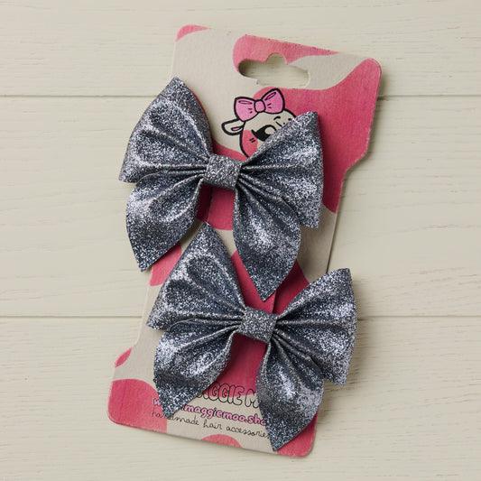 Dark Silver hair bows on a display card