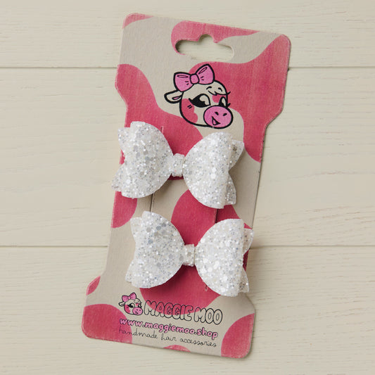 Pearl White Jazz Glitter Hair Bows on a display card