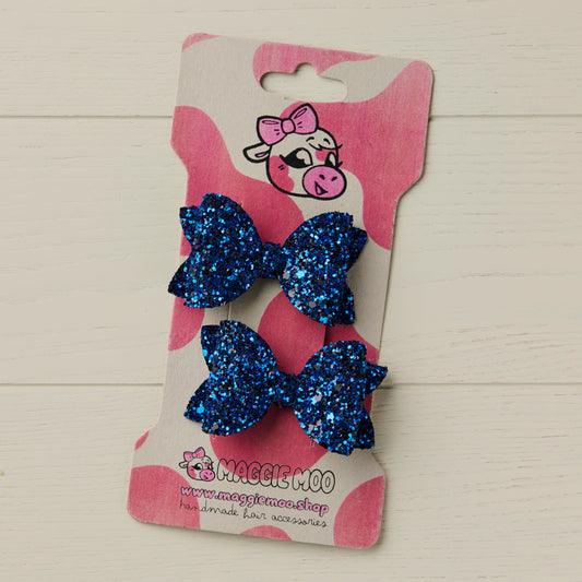 Royal Blue Mini Glitter Bows on a display card